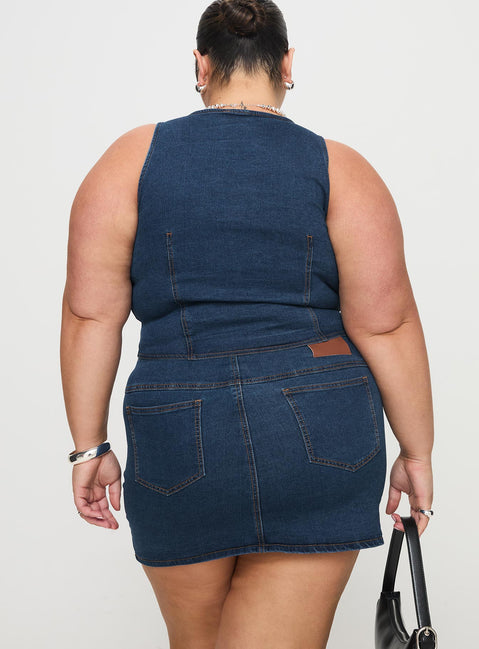 back view of model wearing Princess Polly Popular Low Rise Mini Skirt Mid Blue Wash Curve Mini Skirts Skirts 