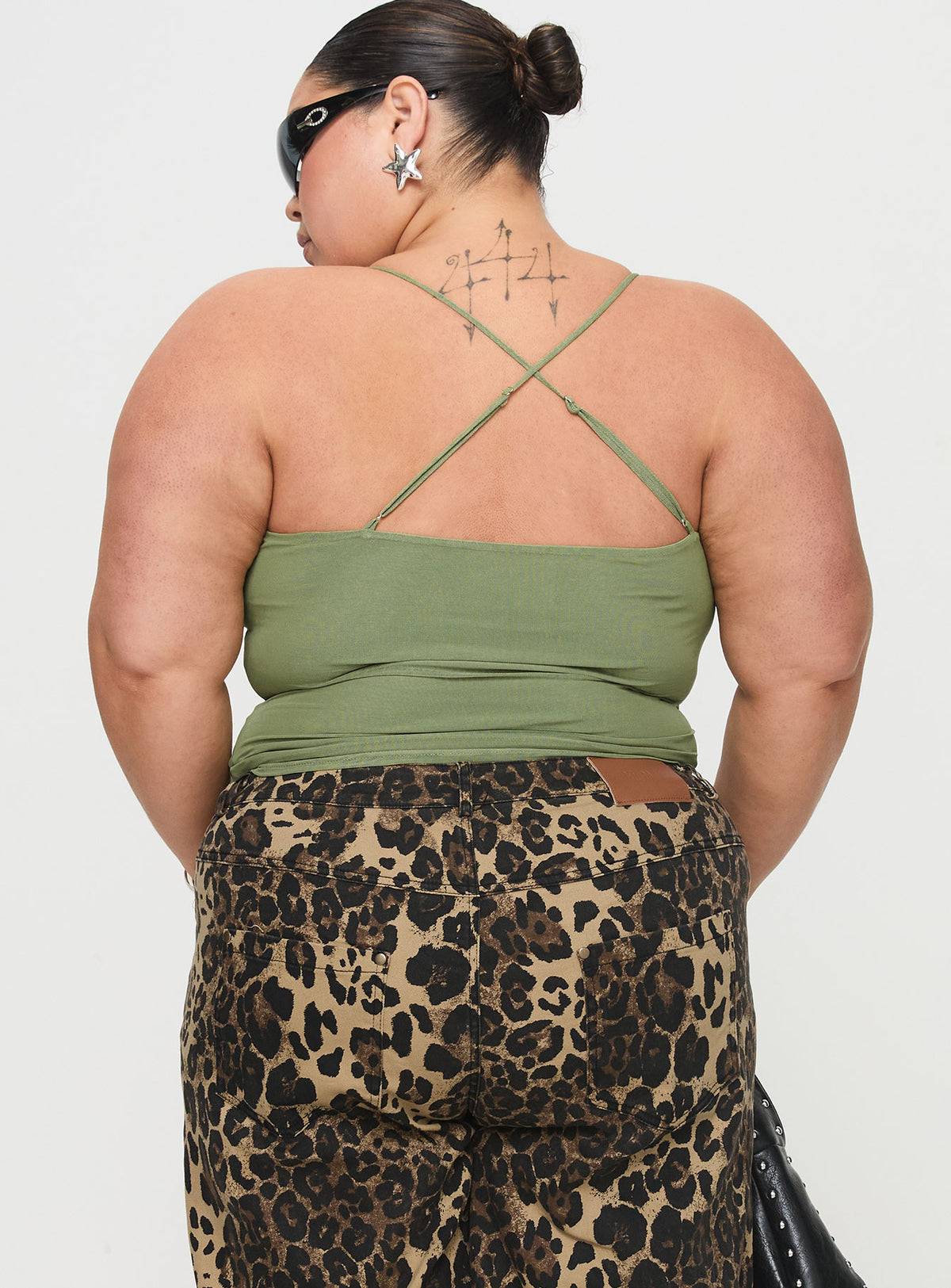 back view of model wearing Princess Polly Miekie Top Green Curve Sleeveless Asymmetric Neckline 