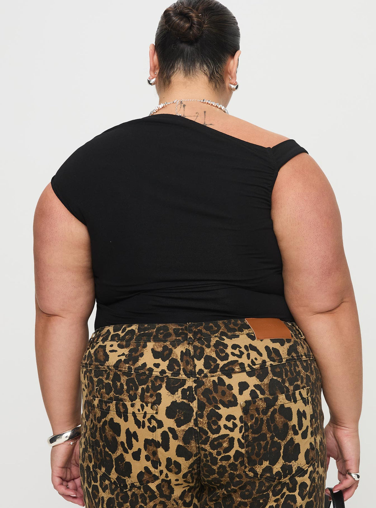 back view of model wearing Princess Polly Beller Bodysuit Black Curve Sleeveless Bodysuit 