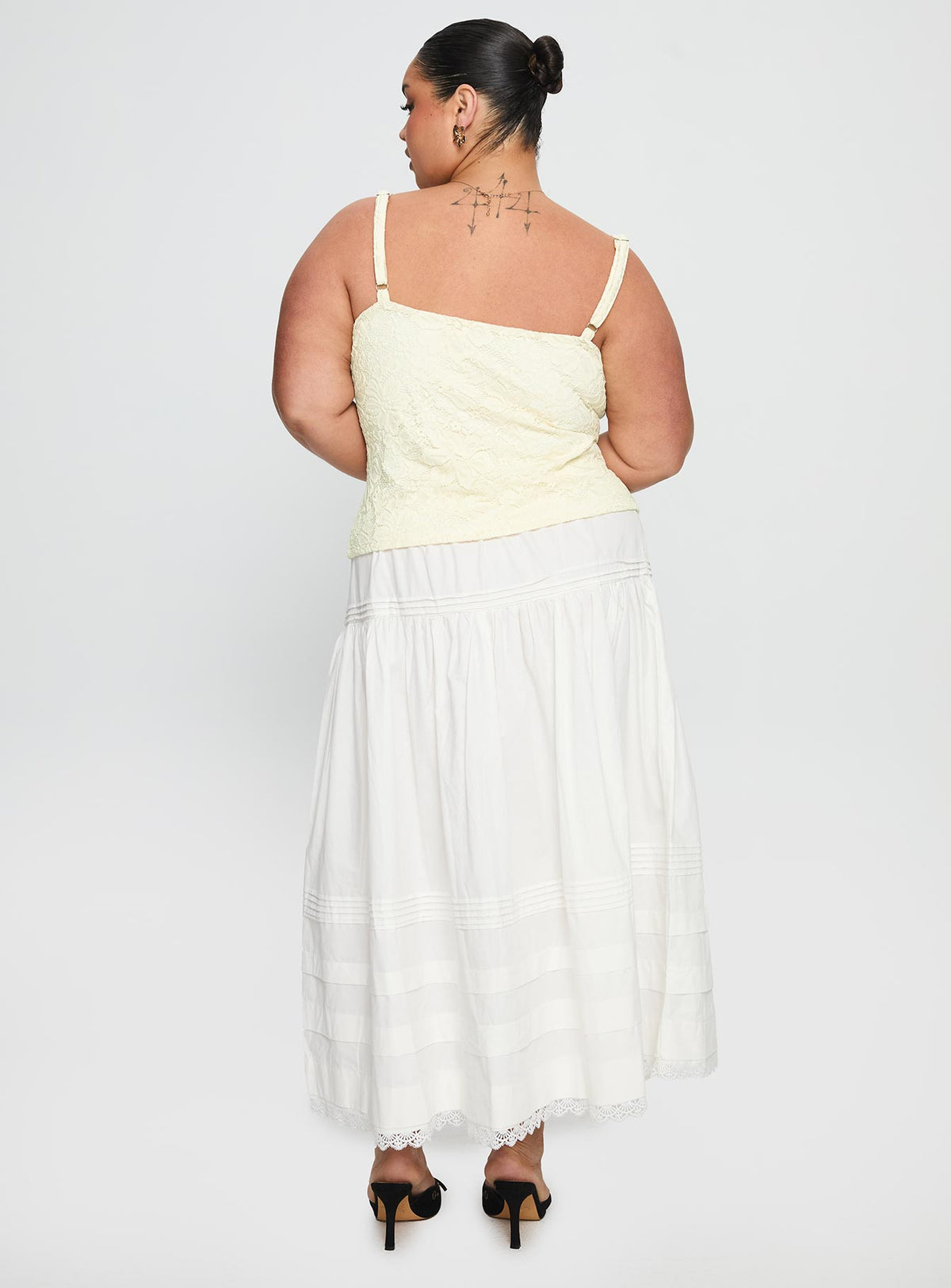back view of model wearing Princess Polly Calling For You Flowy Maxi Skirt White Curve Maxi Skirts Skirts 