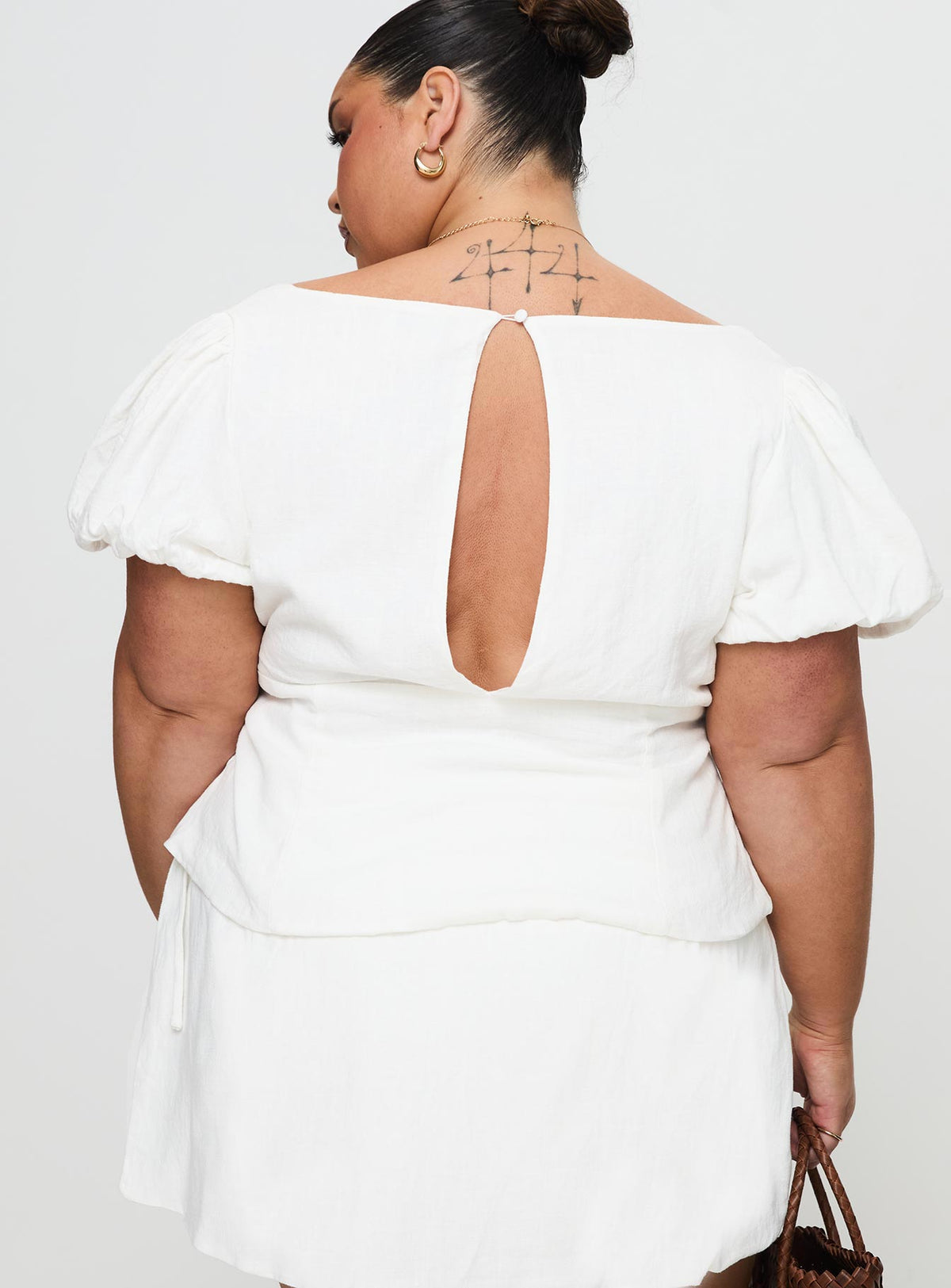back view of model wearing Princess Polly Wilhelmina Blouse Top White Curve Short Sleeves Plunger 