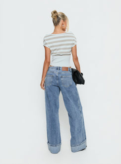 back view of model wearing Princess Polly Ramos Diamante Low Rise Wide Leg Jeans Washed Mid Blue Low Rise Jeans Jeans 
