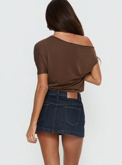 back view of model wearing Princess Polly Nicolina Low Rise Denim Mini Skirt Raw Denim Mini Skirts Skirts 