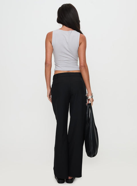 back view of model wearing Princess Polly Sallon Low Rise Pants Black Low Rise Pants Pants 