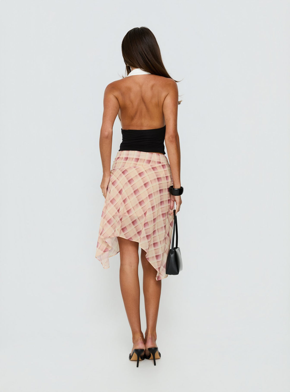 back view of model wearing Princess Polly Natana Asymmetrical Midi Skirt Multi Check Skirts 