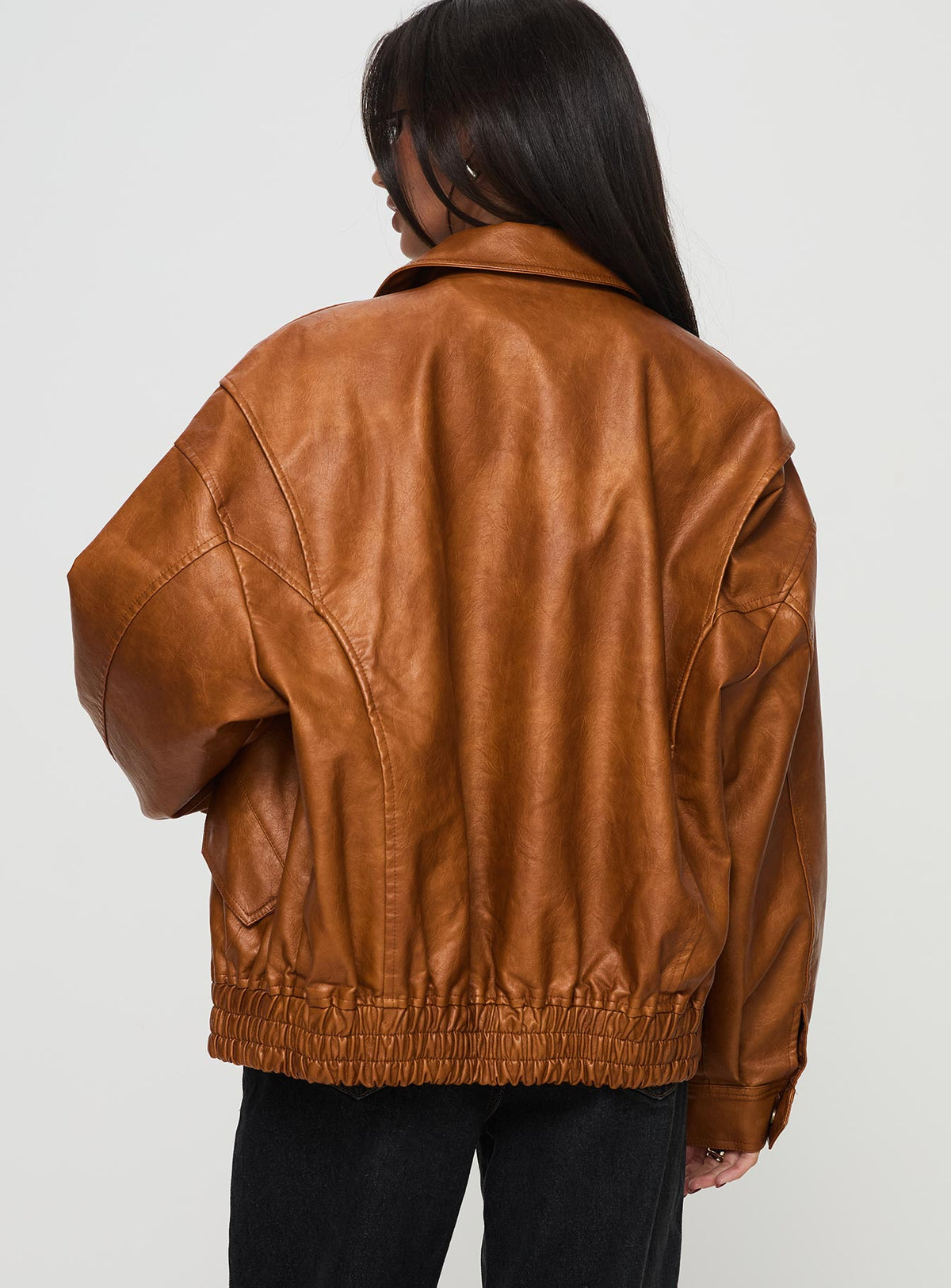 Faux leather bomber jacket Classic collar, zip & button fastening down front, twin hip pockets with press button fastening, elasticated waistband, single button cuff Non-stretch material, fully lined