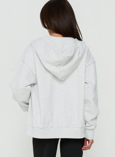 Crafted from quality fabric, the All Day Studded Oversized Hoodie Grey Marle womens-jumpers with short length back view of model wearing Princess Polly