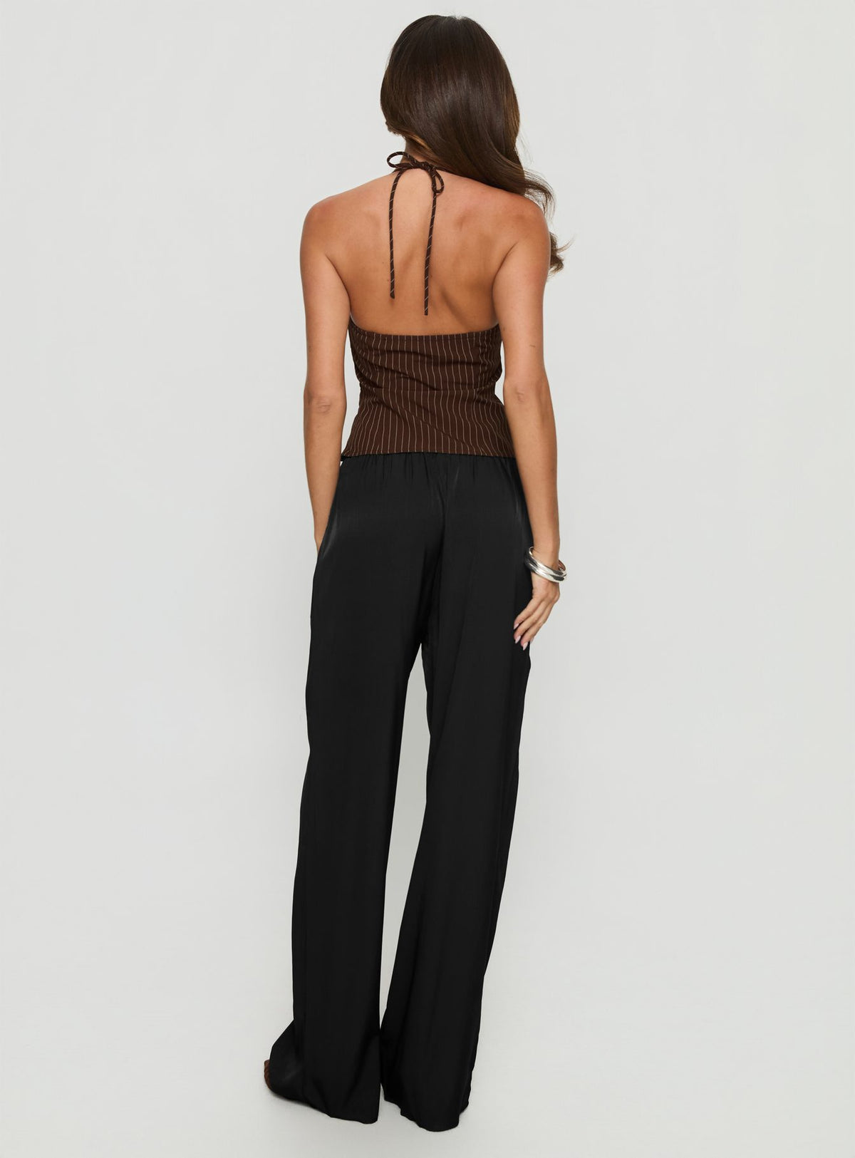 back view of model wearing Princess Polly Breina Satin Straight Leg Pants Black High Rise Pants Pants 