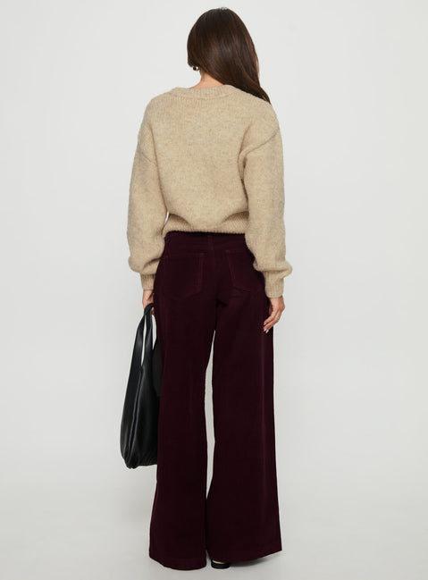 back view of model wearing Princess Polly Jacynda Low Waist Wide Leg Corduroy Jeans Currant Mid Rise Jeans Jeans 