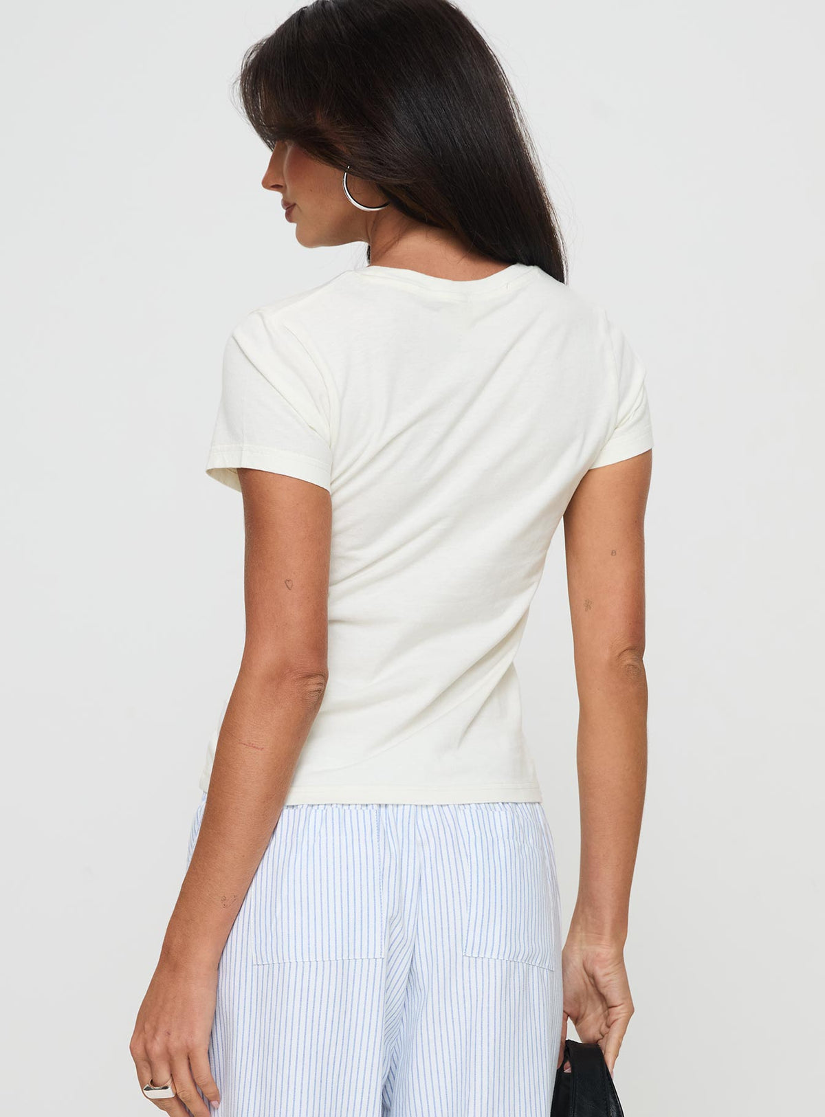 back view of model wearing Princess Polly Tease Me Top Cream Short Sleeves Crew Neck 