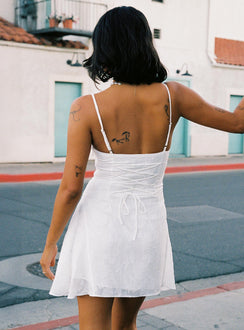 back view of model wearing Princess Polly Wispie Lace Up Mini Dress White Square Neck 