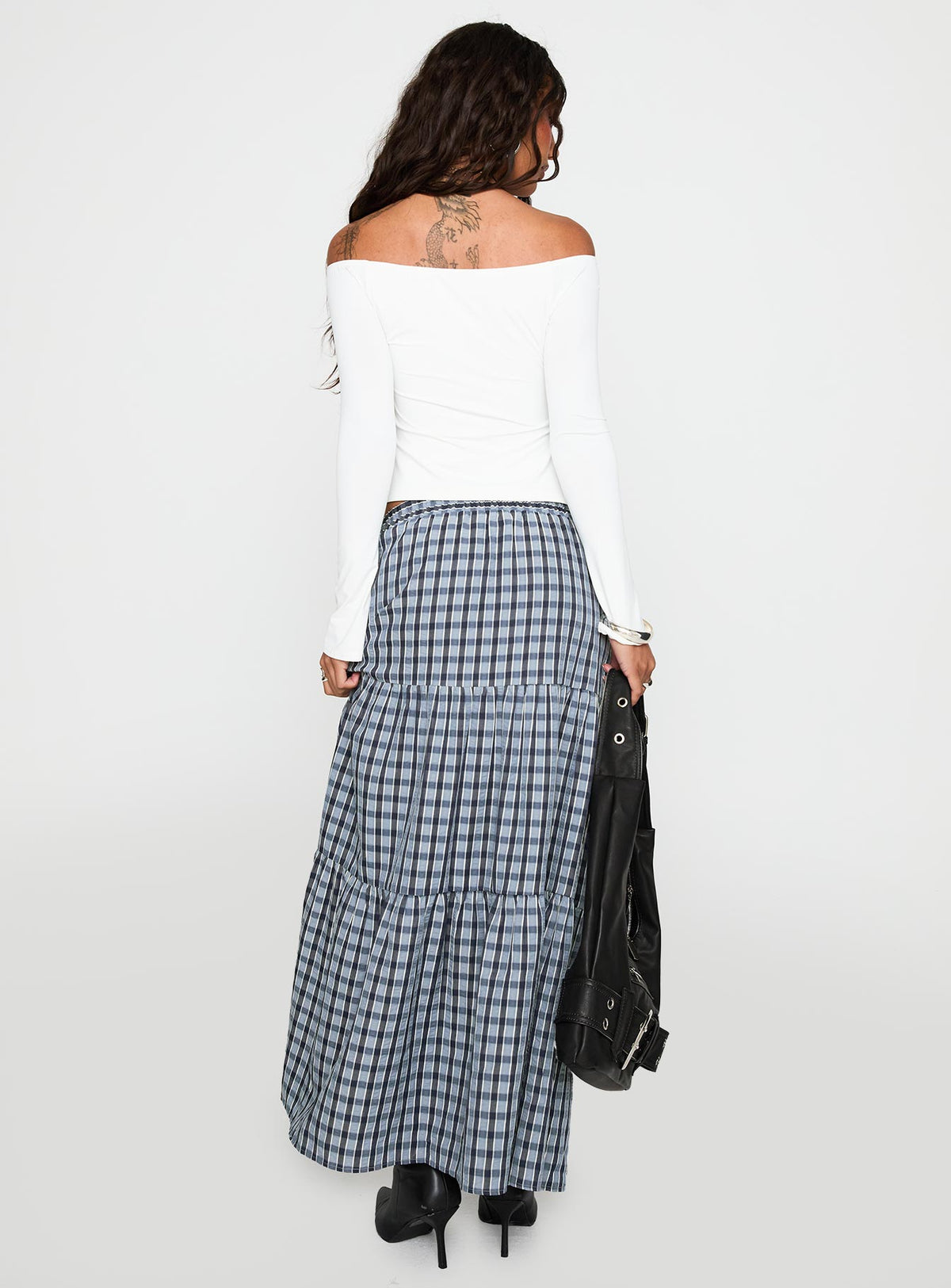 back view of model wearing Princess Polly Rockwell Tiered Midi Skirt Navy Check Maxi 