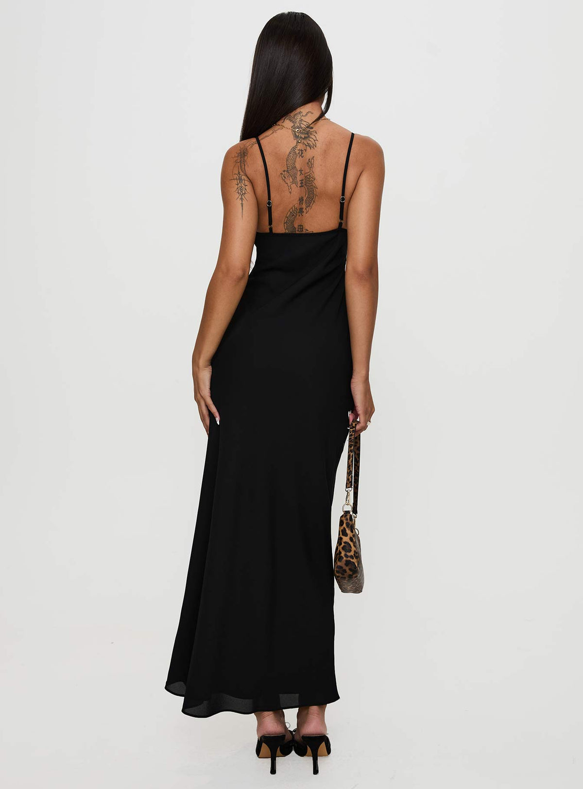 back view of model wearing Princess Polly Artea Maxi Dress Black Plunger 