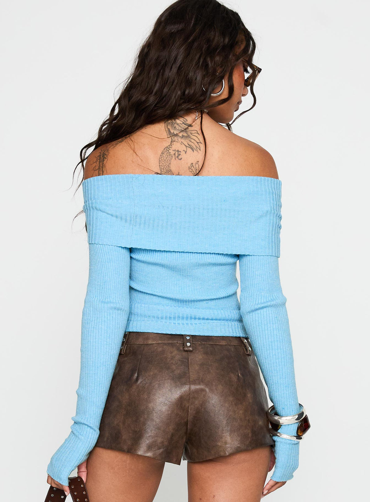 back view of model wearing Princess Polly Morley Off Shoulder Sweater Blue Cropped Jumpers Jumpers 