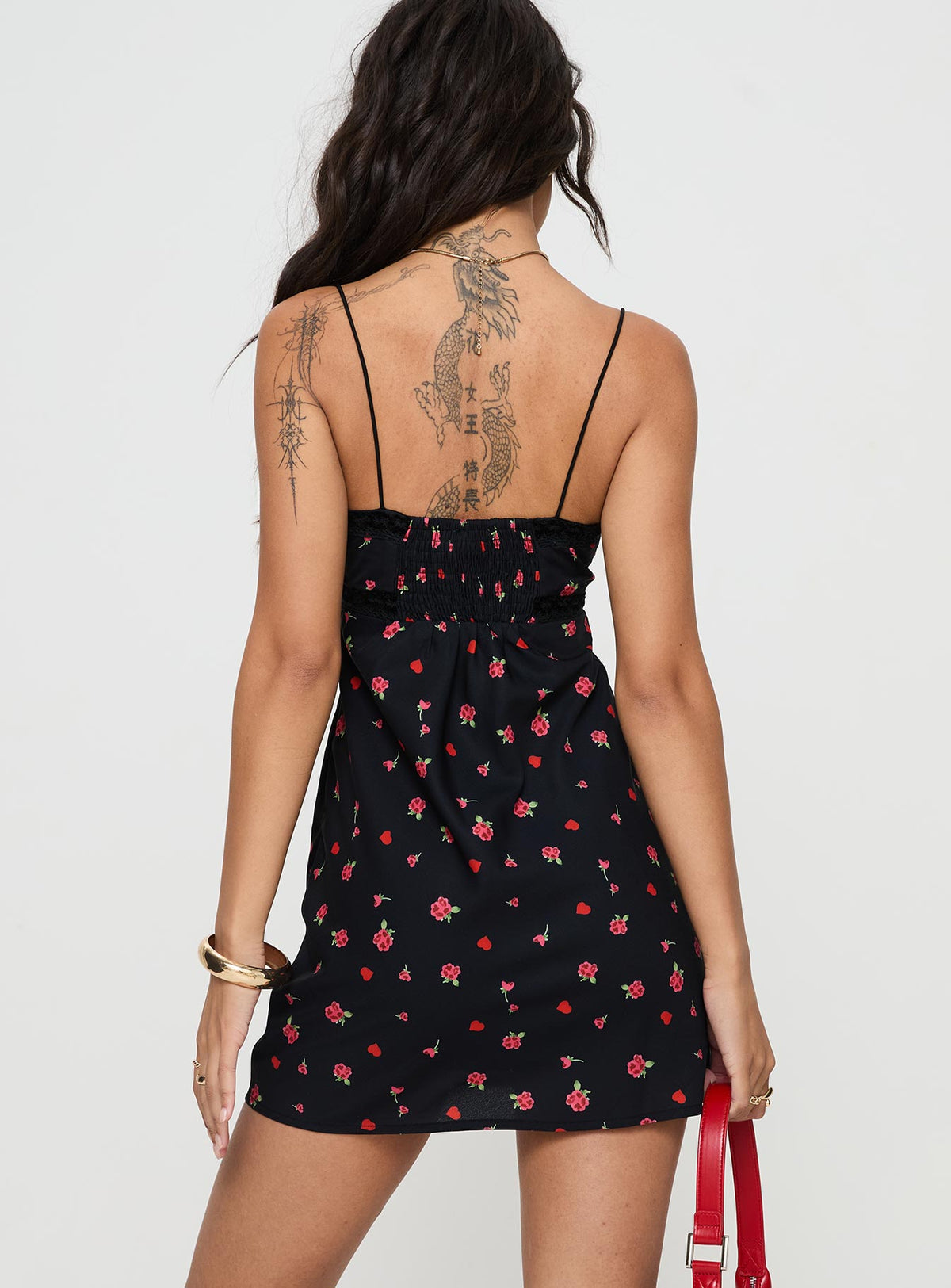 back view of model wearing Princess Polly Emilee Mini Dress Black / Floral Plunger 