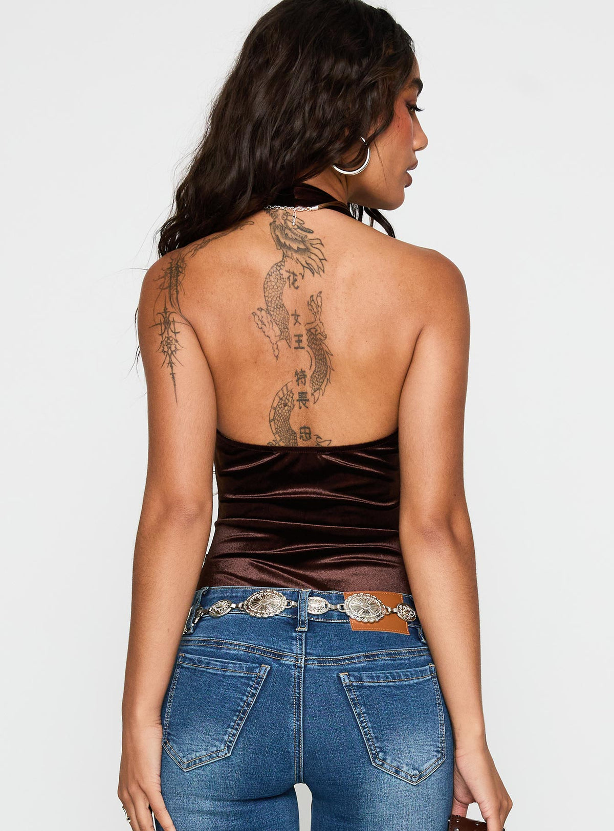 back view of model wearing Princess Polly Ruelle Halter Bodysuit Brown Sleeveless Bodysuit 