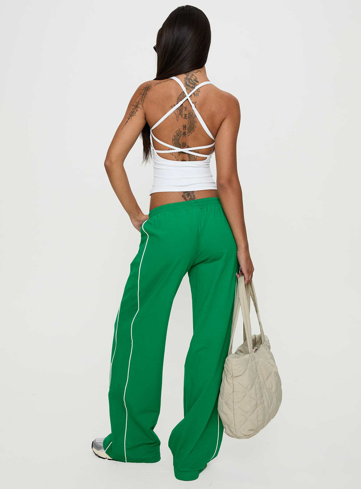 back view of model wearing Princess Polly Field Day Track Pants Green High Rise Pants Pants 