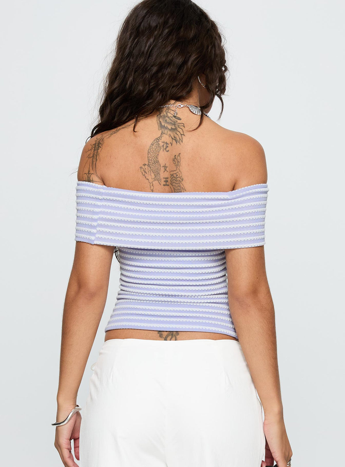 back view of model wearing Princess Polly Ausha Off Shoulder Top Lilac Stripe Short Sleeves straight 