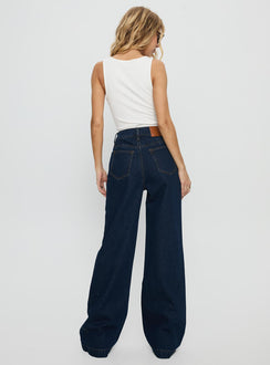back view of model wearing Princess Polly Goldie High Rise Wide Leg Jeans Indigo High Rise Jeans Jeans 