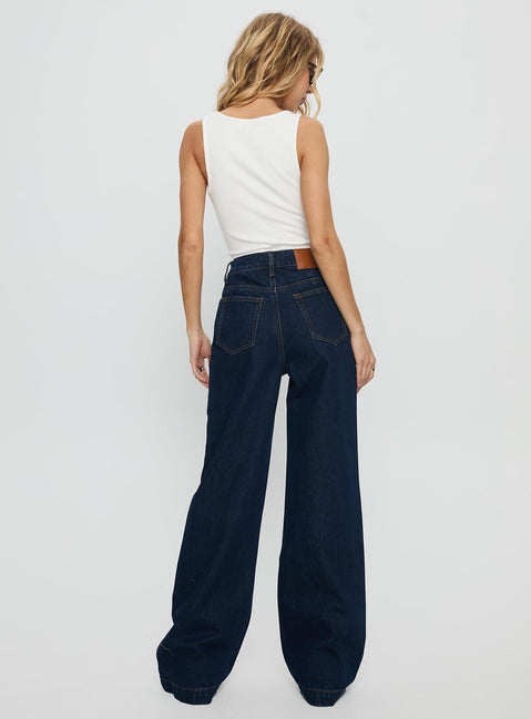 back view of model wearing Princess Polly Goldie High Rise Wide Leg Jeans Indigo High Rise Jeans Jeans 