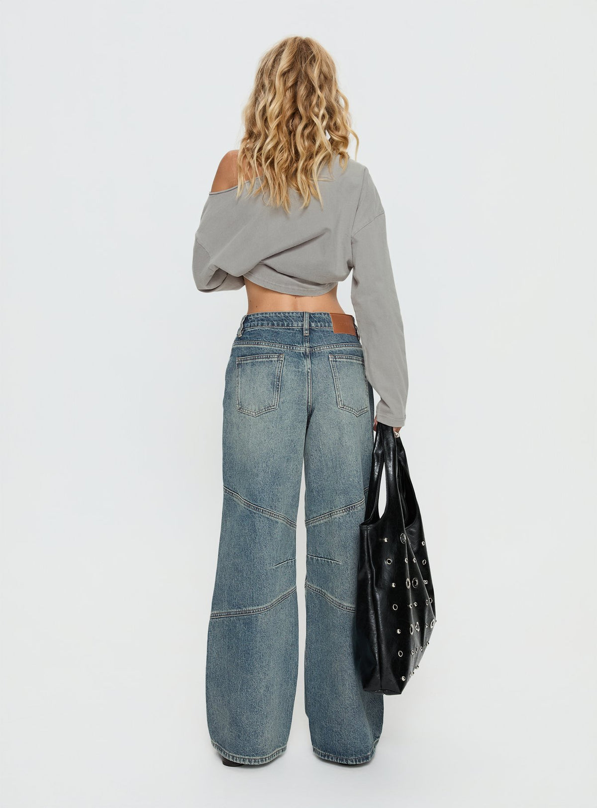 back view of model wearing Princess Polly Atmosphere Mid Rise Straight Leg Jeans Antique Wash Low Rise Jeans Jeans 