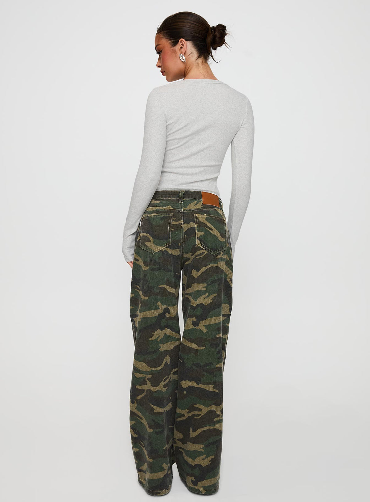 back view of model wearing Princess Polly Briony Mid Rise Wide Leg Jeans Camouflage Low Rise Jeans Jeans 