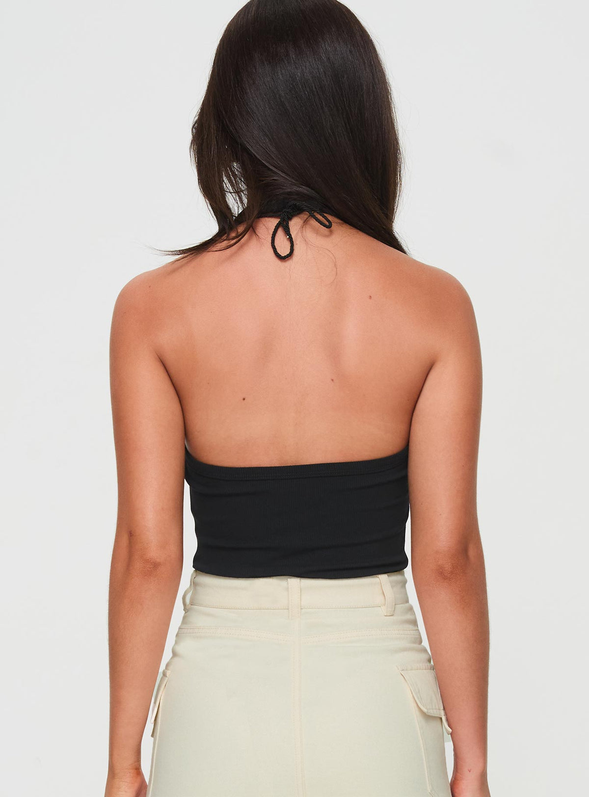 back view of model wearing Princess Polly Find You Halter Bodysuit Black Sleeveless Bodysuit 