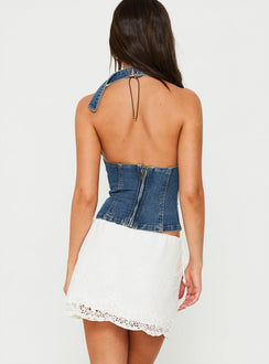 Presenting the Always Dancing Embroidered Mini Skirt White womens-skirts with mini length back view of model wearing