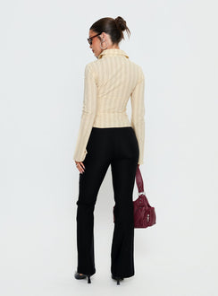 back view of model wearing Princess Polly Dariana Flare Pants Black Mid Rise Pants Pants 