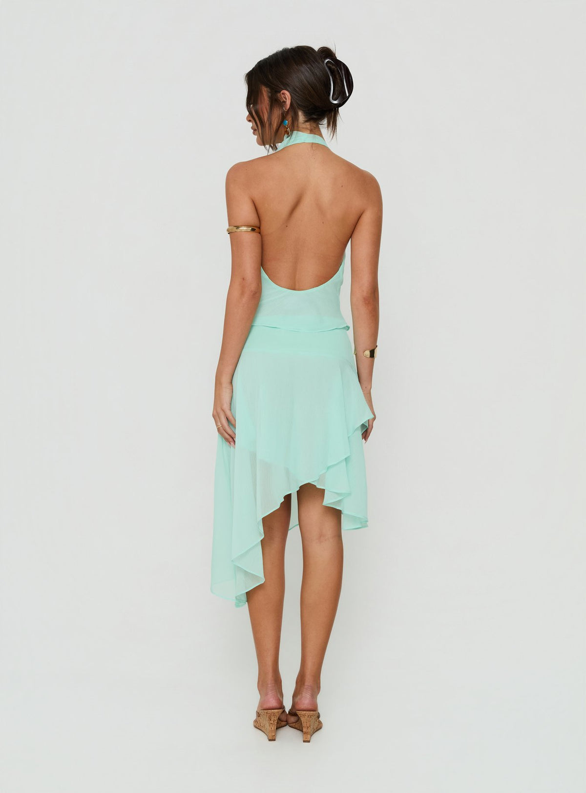 Highlighting the Evaleine Asymmetrical Chiffon Midi Skirt Blue womens-skirts back view of model wearing Princess Polly