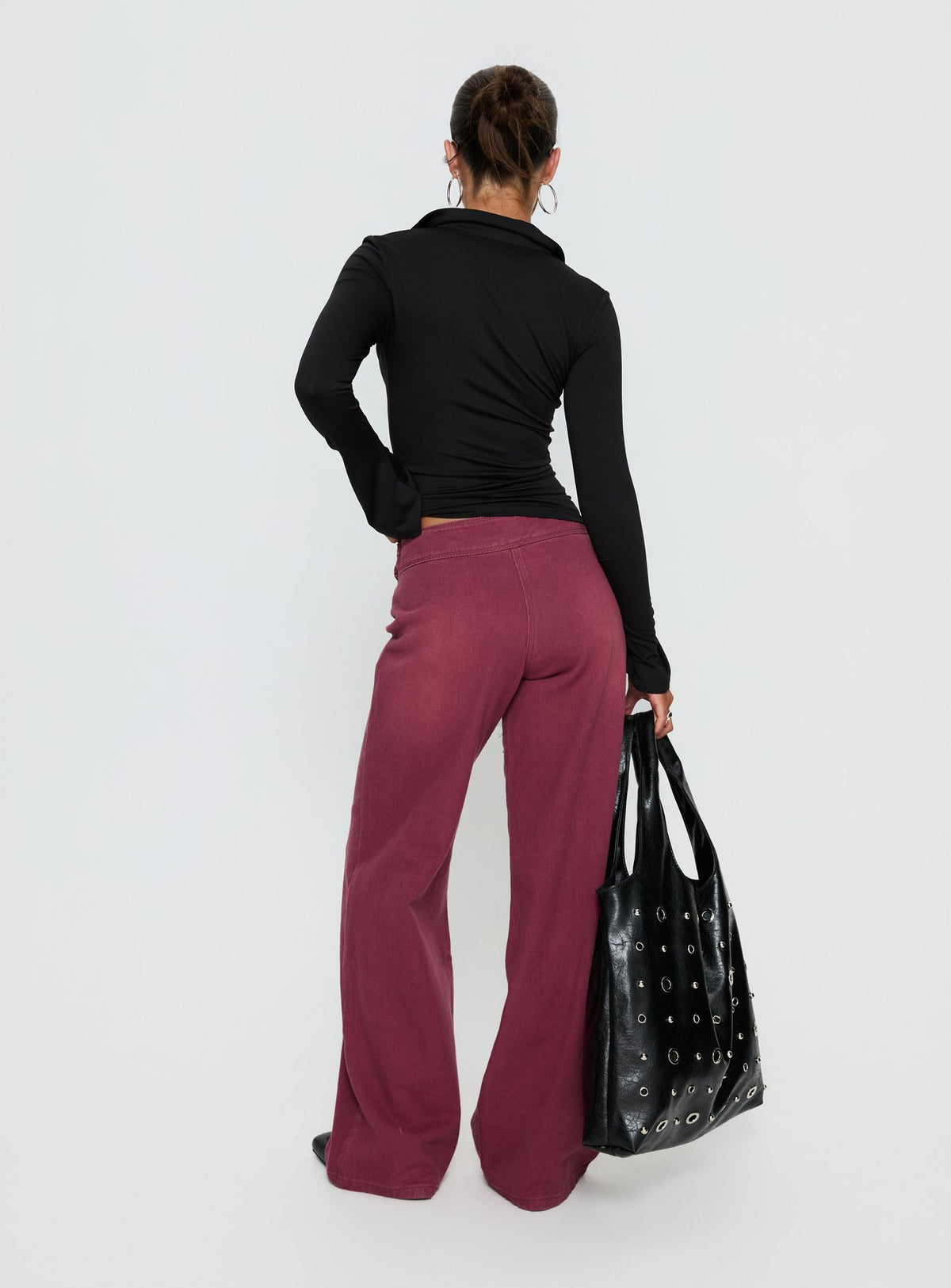 back view of model wearing Princess Polly Boxie Mid Rise Wide Leg Jeans Washed Burgundy Mid Rise Jeans Jeans 