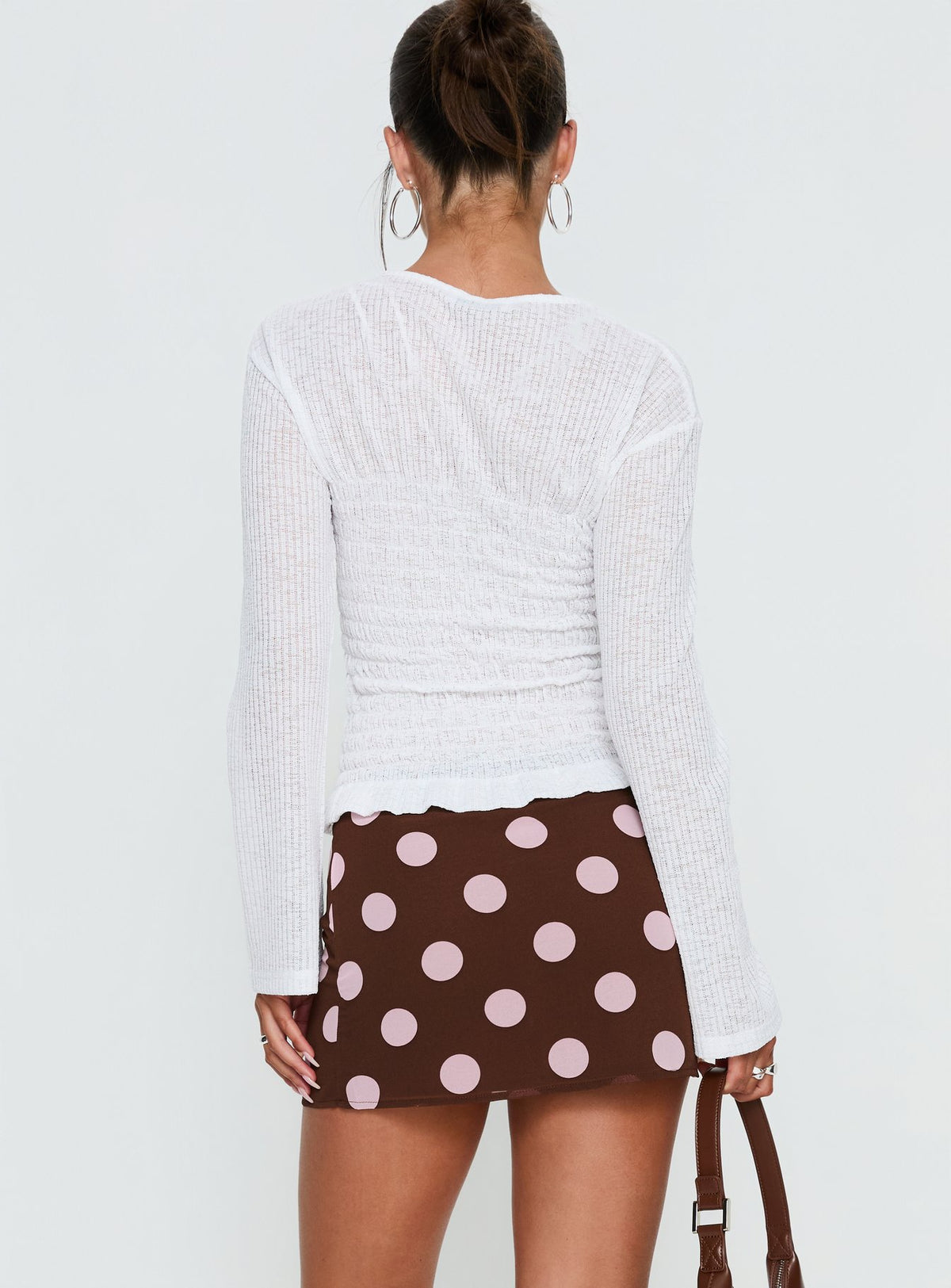 back view of model wearing Princess Polly Adelaida Mini Skirt Brown / Pink Polka Mini Skirts Skirts 