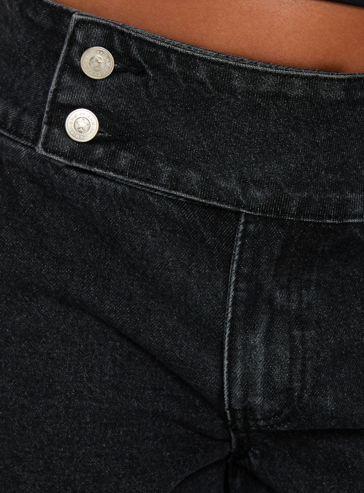 Showcasing the Nikoletta Foldover Jeans Washed Black in high-rise wide-leg style Princess Polly