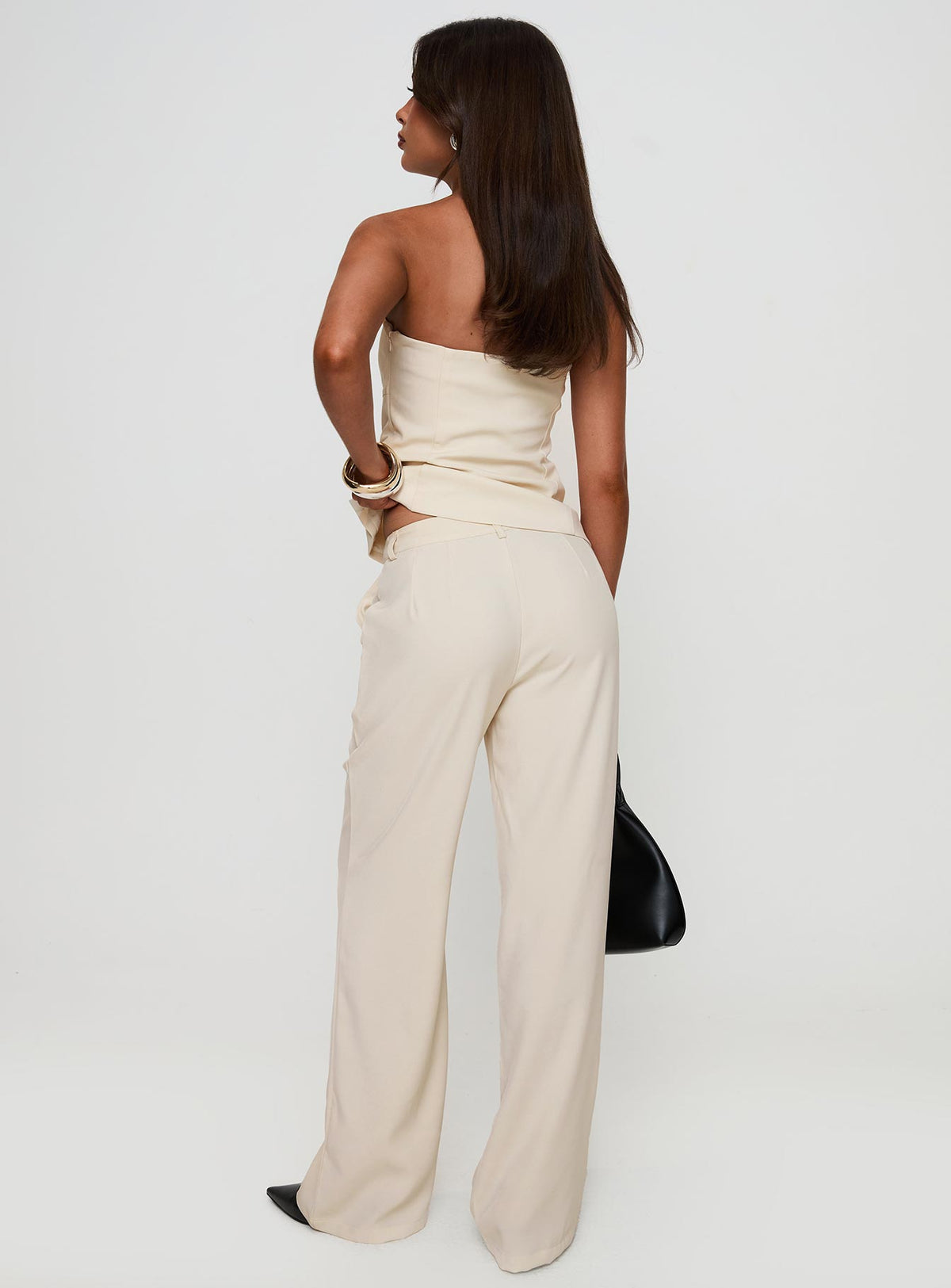 back view of model wearing Princess Polly Irresistible Wide Leg Pant Cream Petite High Rise Pants Pants 
