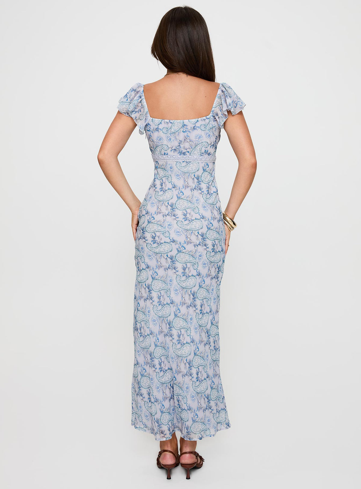 back view of model wearing Princess Polly Dahleia Maxi Dress Blue Paisley V-Neck 