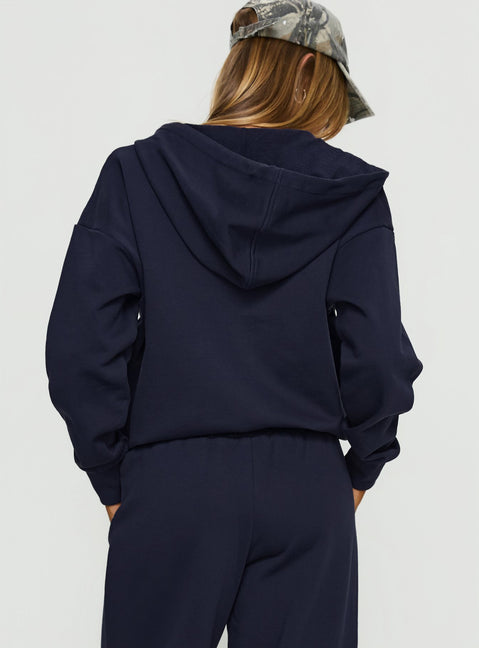 back view of model wearing Princess Polly All Day Oversized Hoodie Navy cropped Jumpers 