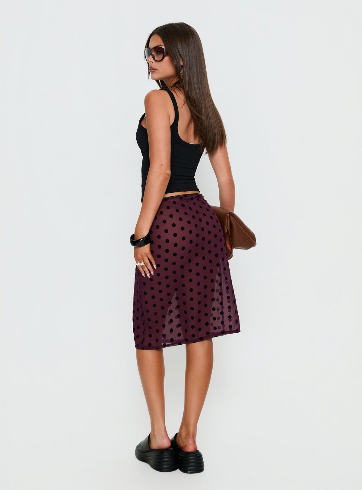back view of model wearing Princess Polly Evani Sheer Chiffon Midi Skirt Polka Maroon Midi Skirts Skirts 