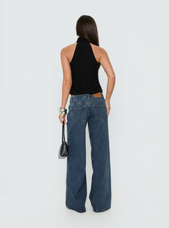 Styled with the Picco Ultra Low Rise Wide Leg Jeans Dark Blue Wash Petite in womens-jeans featuring low-rise waist back view of model wearing Princess Polly