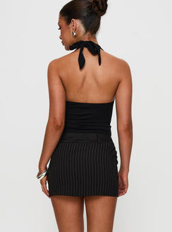back view of model wearing Princess Polly Christel Pinstripe Skort Black Mini Skirts Skirts 