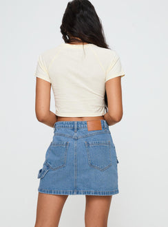 back view of model wearing Princess Polly Chillders Denim Mini Skirt Mid Wash Tall Mini Skirts Skirts 