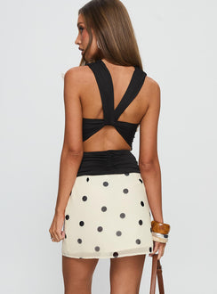 back view of model wearing Princess Polly Adelaida Ruffle Mini Skirt Cream Polka Dot Mini Skirts Skirts 