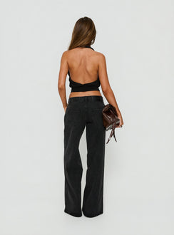 Highlighting the Picco Ultra Low Rise Wide Leg Jeans Washed Black in womens-jeans back view of model wearing