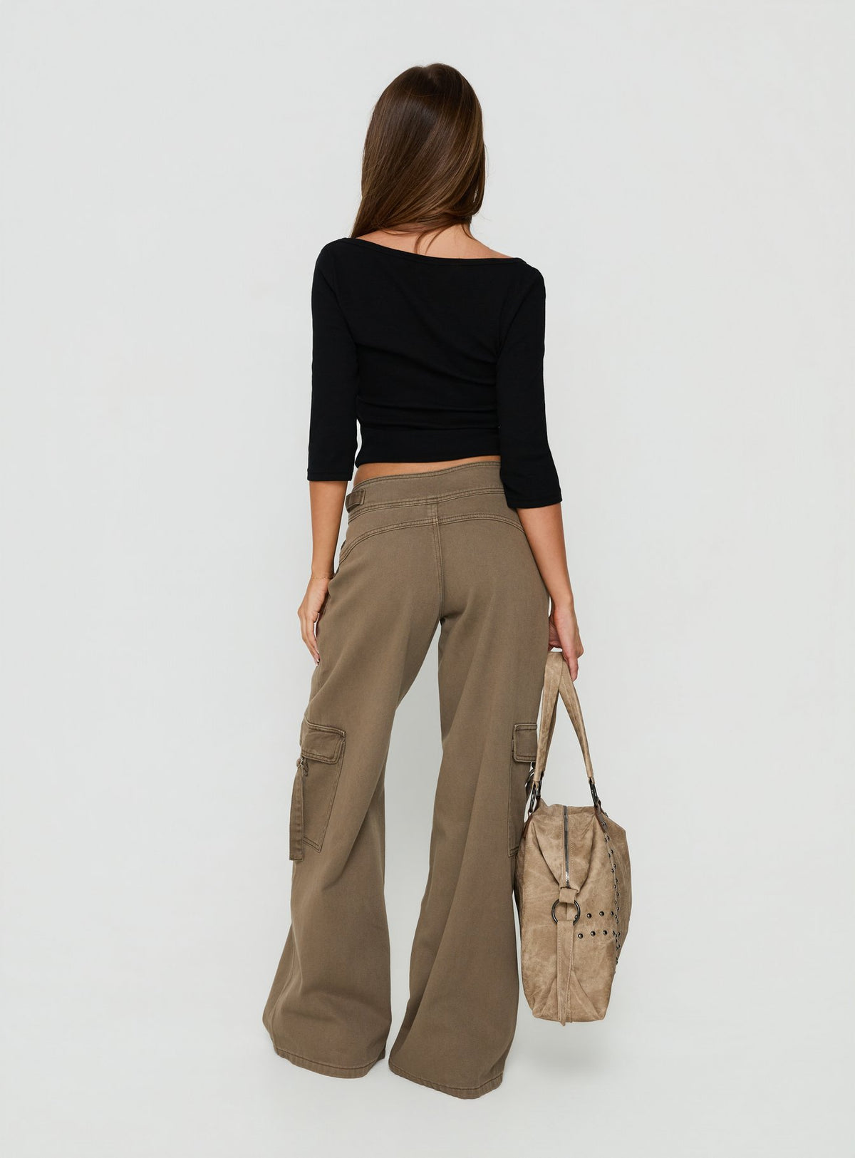 Introducing Kellenna Straight Leg Low Rise Cargo Pants Khaki in dark khaki with a belt and low-rise design back view of model wearing Princess Polly