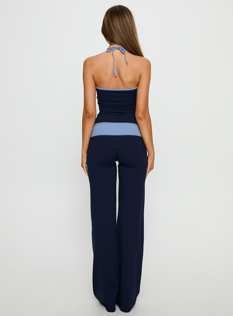 back view of model wearing Princess Polly Kobee Jersey Flare Pants Navy / Light Blue High Rise Pants Pants 
