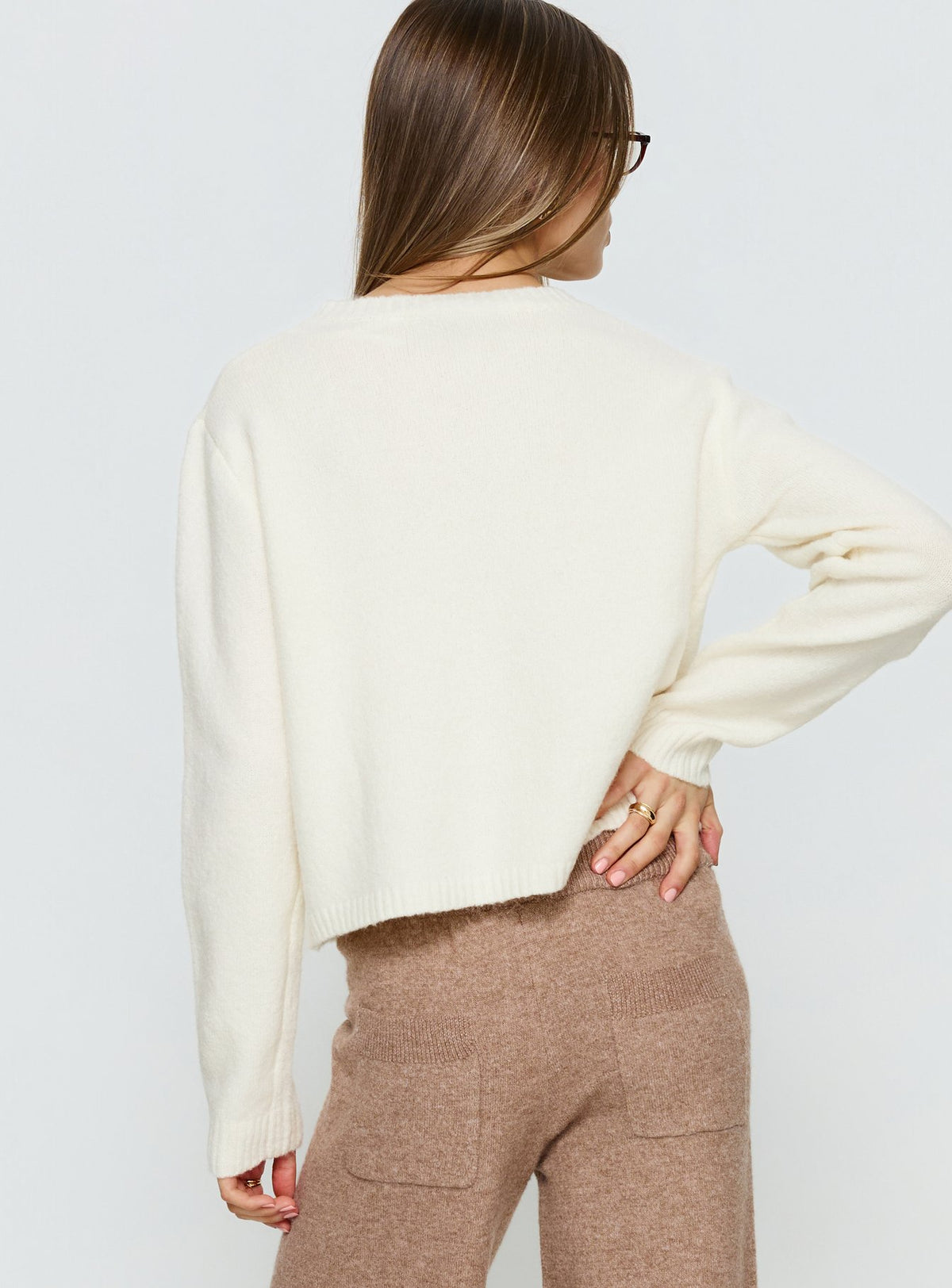 back view of model wearing Princess Polly Denmark Cardigan White Cropped Jumpers Jumpers 