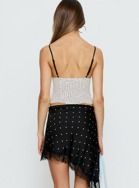 back view of model wearing Princess Polly Idette Lace Asymmetrical Mini Skirt Black Polka Dot Mini Skirts Skirts 