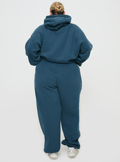 back view of model wearing Princess Polly Princess Polly Track Pants Block / Cursive Text Slate Curve Pants 