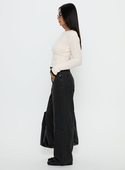 side view of model wearing Princess Polly Lando Low Rise Straight Leg Jeans Washed Black Low Rise Jeans Jeans 