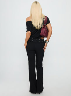 back view of model wearing Princess Polly Kortnee Eyelet Detail Flare Leg Pants Black Low Rise Pants Pants 