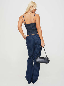back view of model wearing Princess Polly Charismatic Low Rise Flared Jeans Dark Pinstripe Low Rise Jeans Jeans 